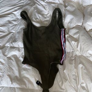 Green bodysuit with stripes on the side